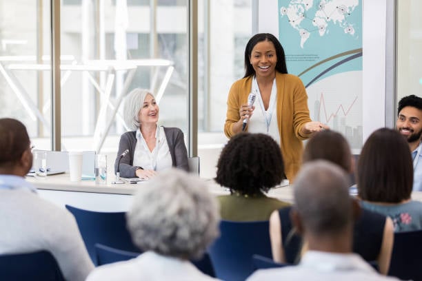 local leader-addresses-audience-during-panel-discussion
